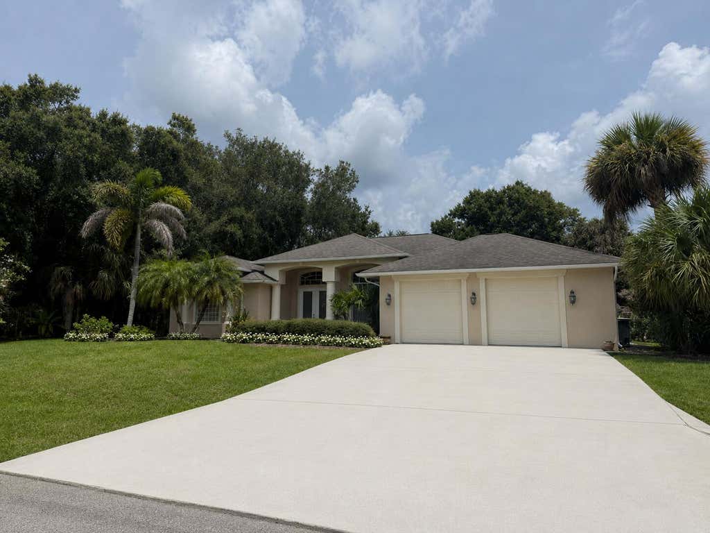 Photo of 2108 Winding Creek Lane, Fort Pierce, FL 34981 (MLS # B26058378)