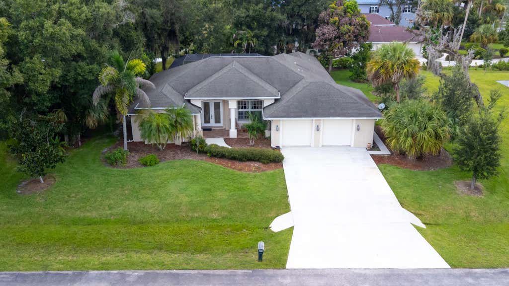 Photo of 2108 Winding Creek Lane, Fort Pierce, FL 34981 (MLS # B26058378)