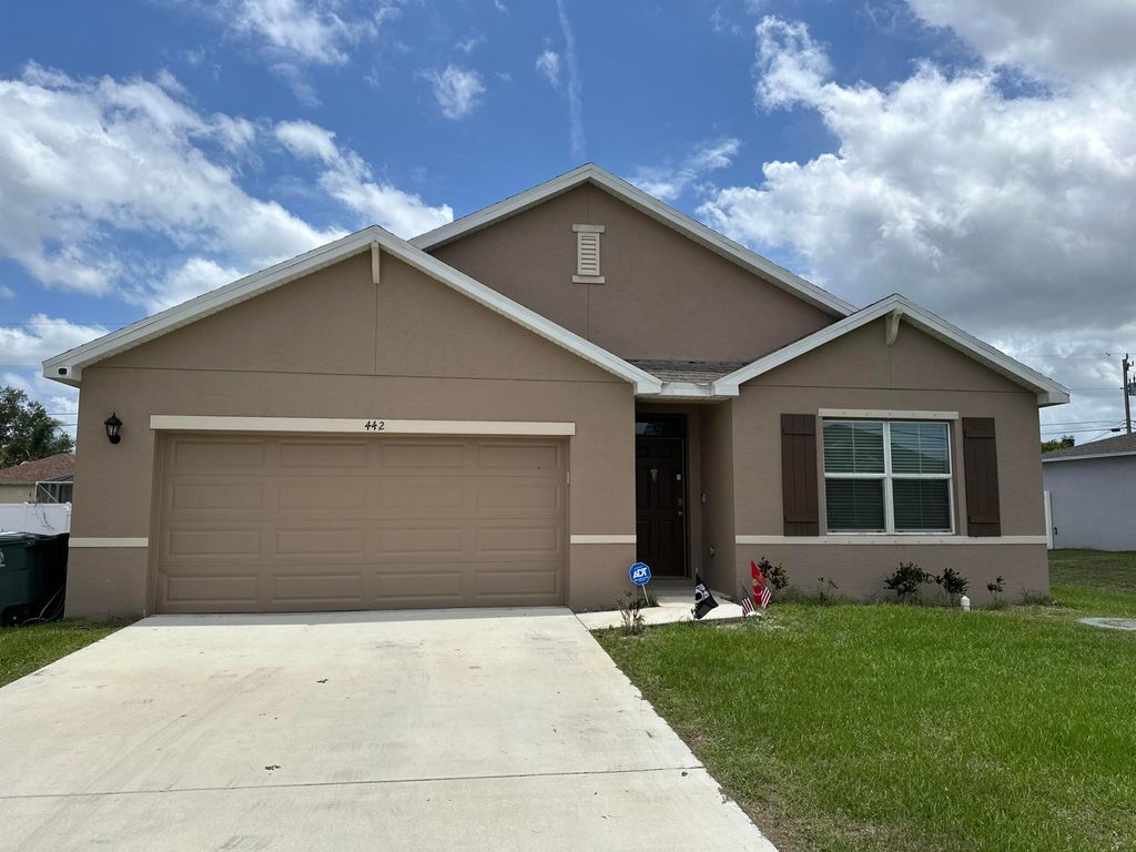 Photo of 442 SW Dahled Avenue, Port Saint Lucie, FL 34953 (MLS # R10993046)