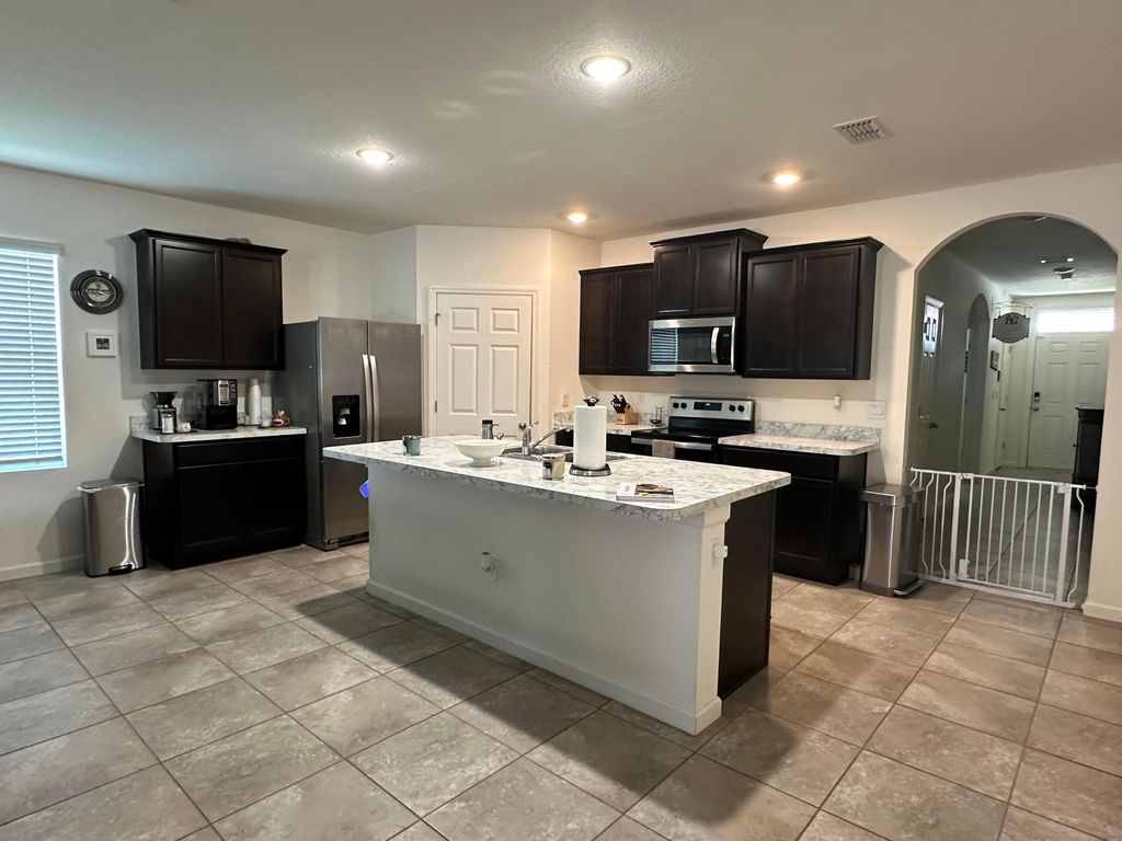 Photo of 442 SW Dahled Avenue, Port Saint Lucie, FL 34953 (MLS # R10993046)