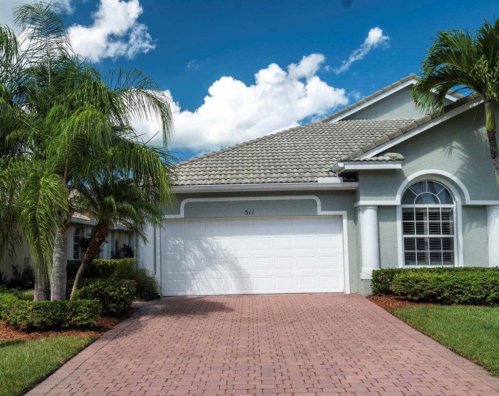 Photo of 511 NW Red Pine Way, Jensen Beach, FL 34957 (MLS # R10915884)