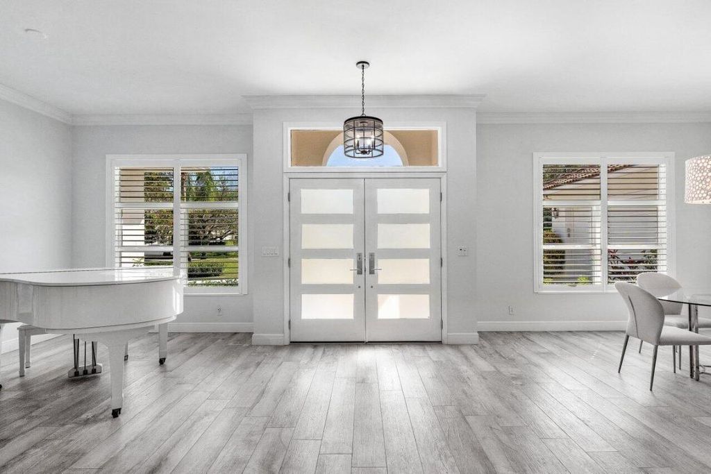 Photo of 8170 Man O War Road, Palm Beach Gardens, FL 33418 (MLS # R10962574)