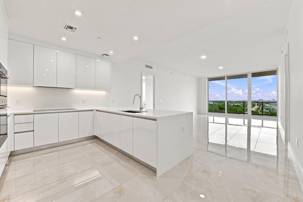Photo of 220 Lake Shore Drive #1517, Lake Park, FL 33403 (MLS # B26074230)