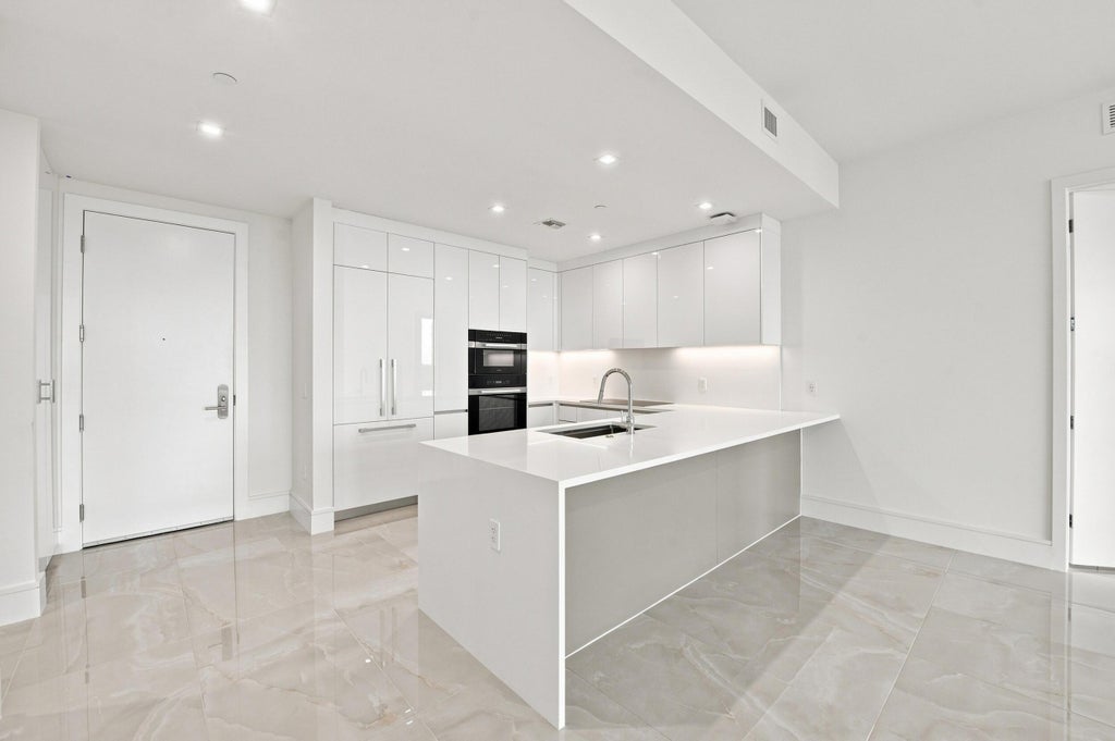 Photo of 220 Lake Shore Drive #1517, Lake Park, FL 33403 (MLS # B26074230)