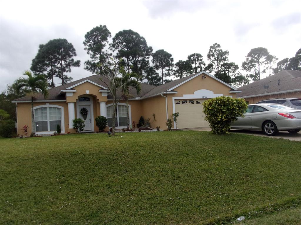 Photo of 1650 SW Buttercup Avenue Ave, Port Saint Lucie, FL 34953 (MLS # R10683075)