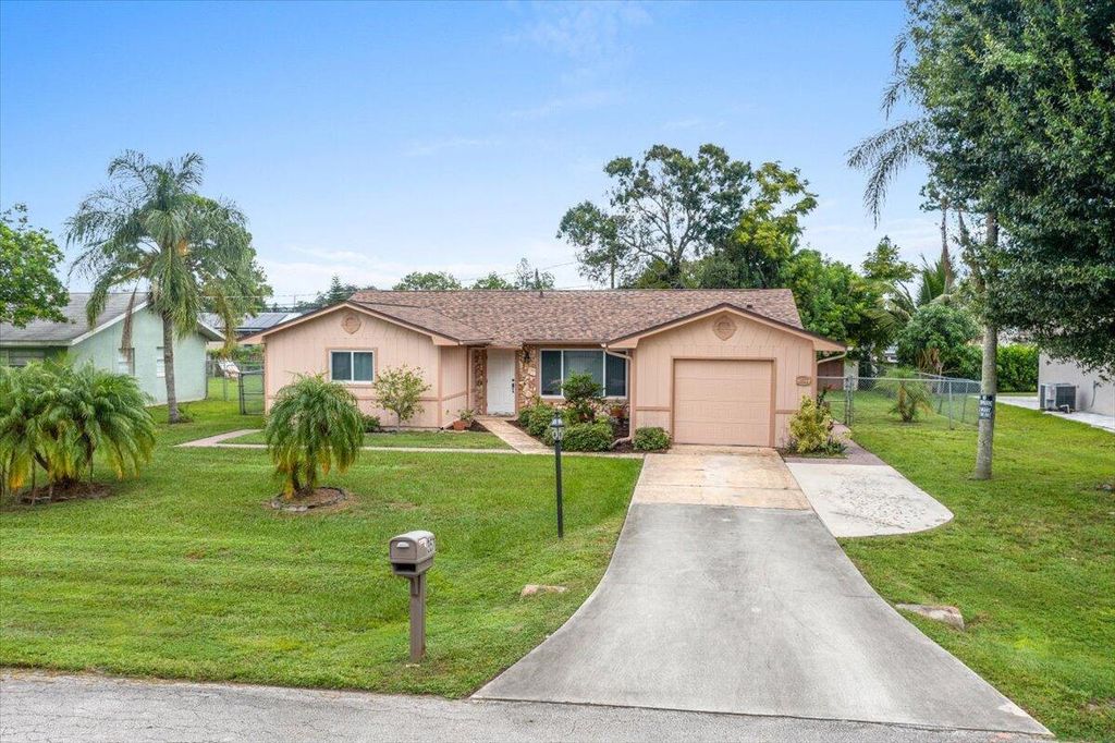 Photo of 357 NW Hogan Street, Port Saint Lucie, FL 34983 (MLS # R11015893)