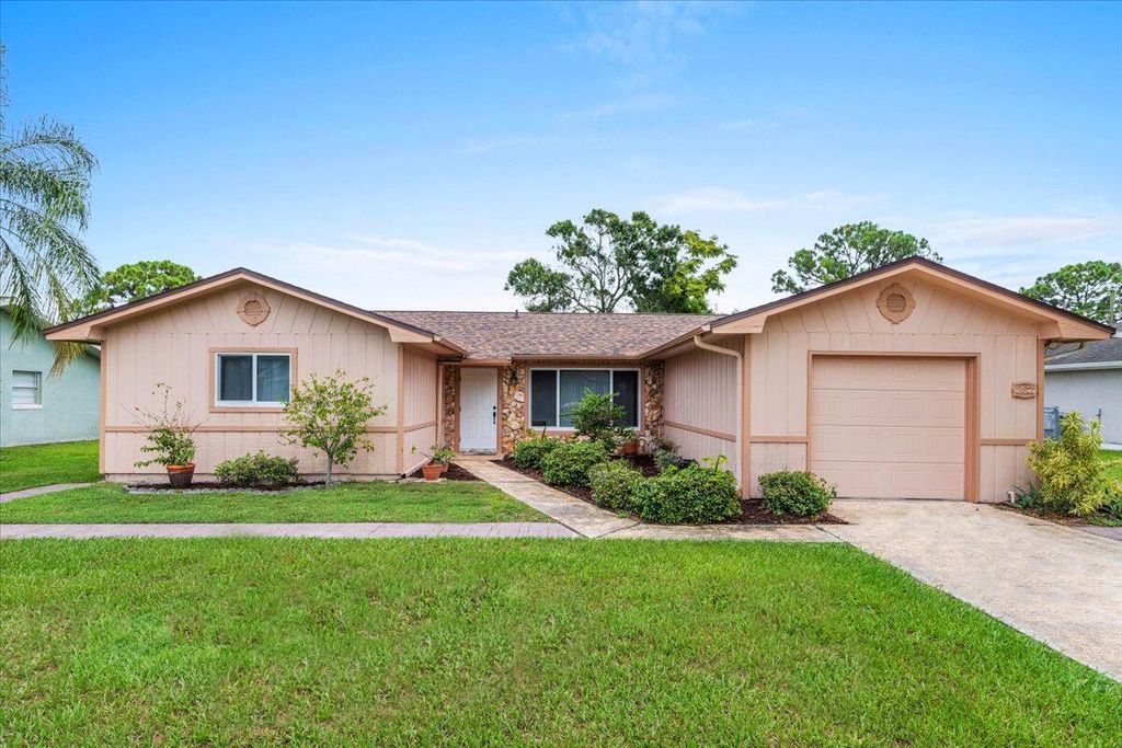 Photo of 357 NW Hogan Street, Port Saint Lucie, FL 34983 (MLS # R11015893)