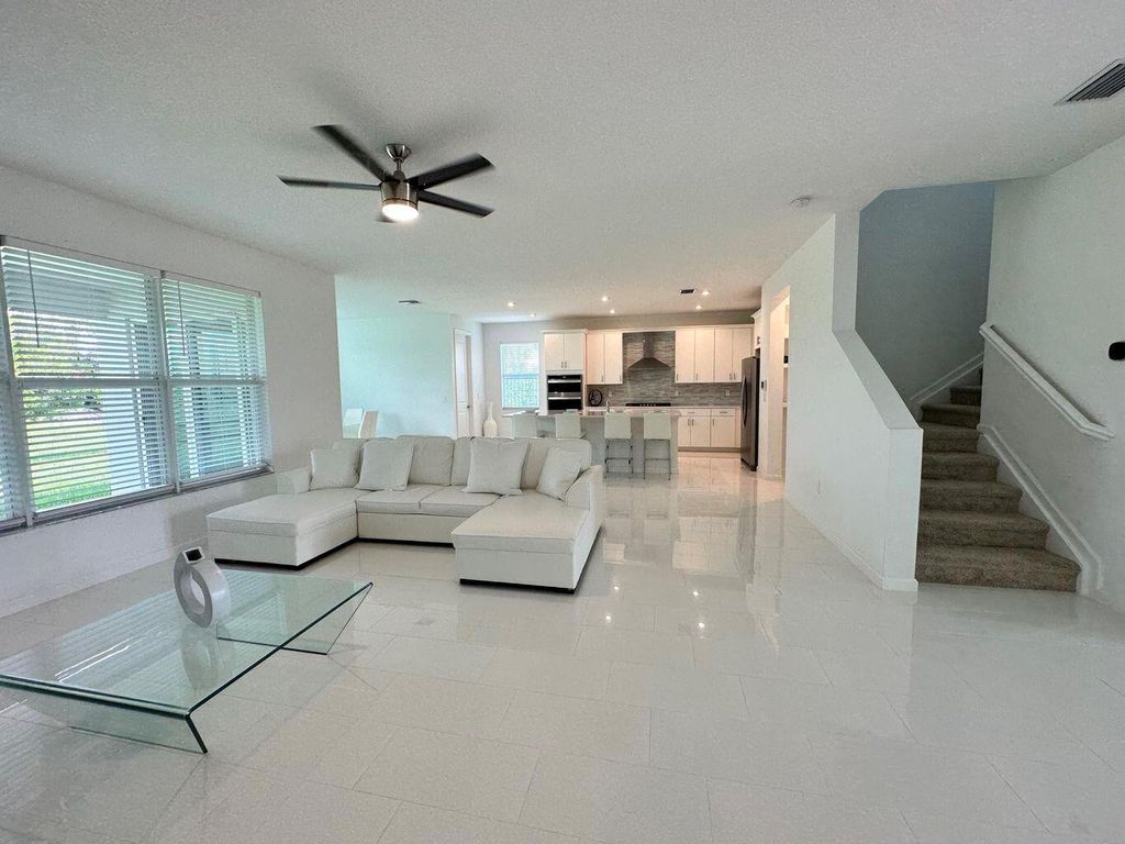 Photo of 10710 SW Hensley Street, Port Saint Lucie, FL 34987 (MLS # R11066703)
