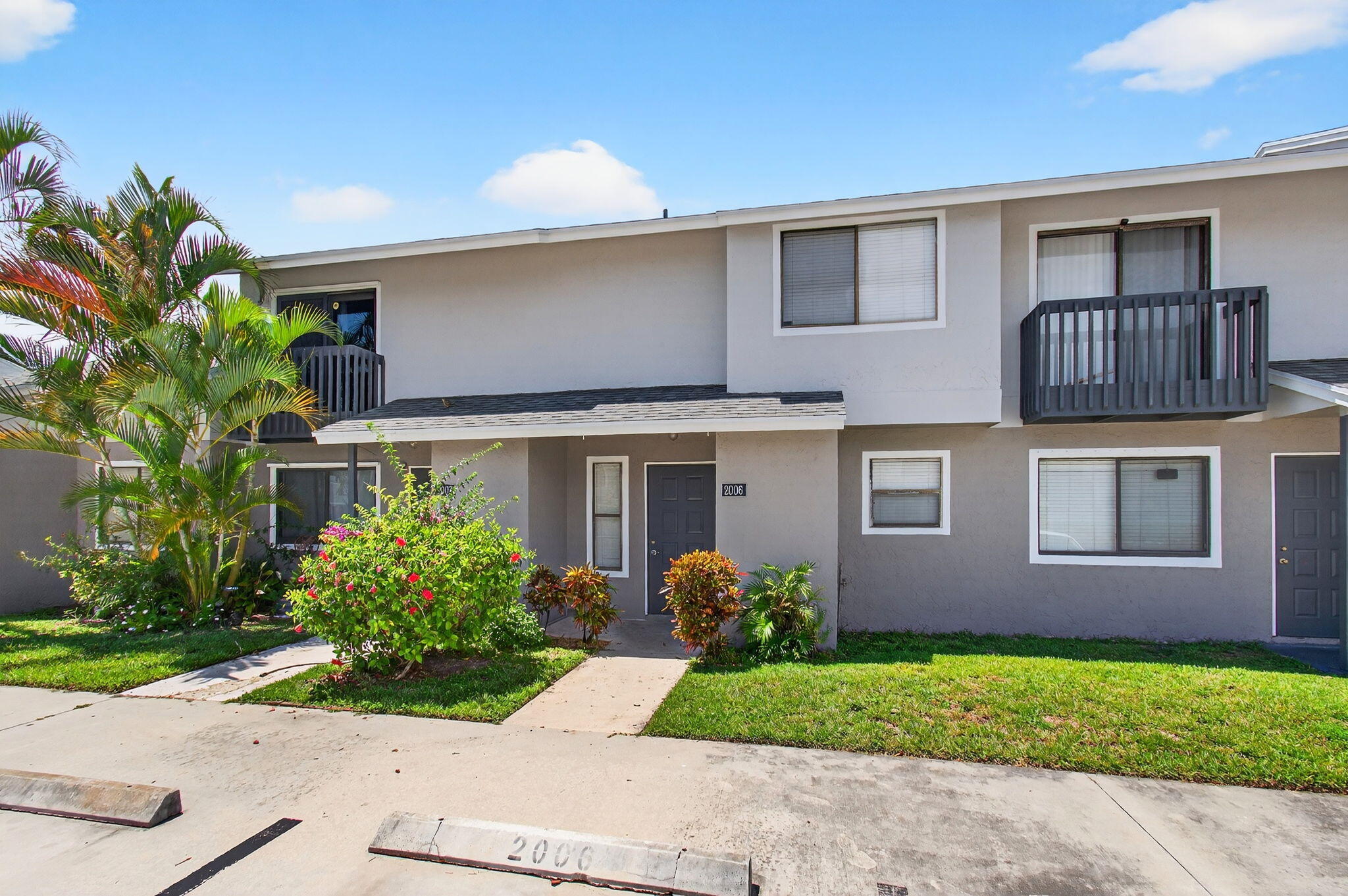 Move-in ready townhome for rent in the heart of Greenacres! This spacious 2-bedroom, 2.5-bath home offers a functional layout with tile and laminate flooring throughout--no carpet. The kitchen opens to a private fenced-in patio, perfect for relaxing or entertaining. Convenient in-unit laundry and an additional front storage room provide extra space.Located in the Canalakes community, residents enjoy access to a renovated pool, splash park, fitness center, tennis courts, and basketball. Walk to nearby Burrowing Owl Park or take advantage of the central location close to shopping, dining, and Palm Beach International Airport.Ready for immediate occupancy--don't miss out on this well-maintained rental in a convenient location!