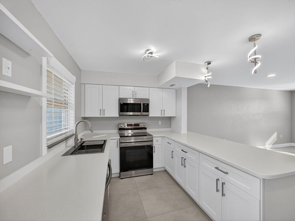 Photo of 1002 Shorewinds Drive, Hutchinson Island, FL 34949 (MLS # R11161945)