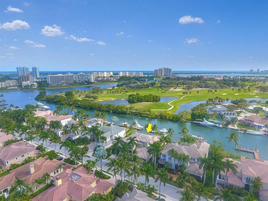 Exceptional custom estate home by one of the area's best builders, Shapiro Pertnoy Companies, with 100' of deep water frontage over-looking the NPB Waterway and the North Palm Beach Country Club golf course. The spacious layout includes an office with custom built-ins, an exercise room off of the master bedroom, a large wet bar and a very expansive loggia with summer kitchen. Other appointments include marble flooring, high end cabinetry and appliances, Icynene insulated attic, water barriers on all exterior walls, impact window and doors and a 45 KW Generac generator. The 60' dock is equipped with a 10,000lb boat lift.