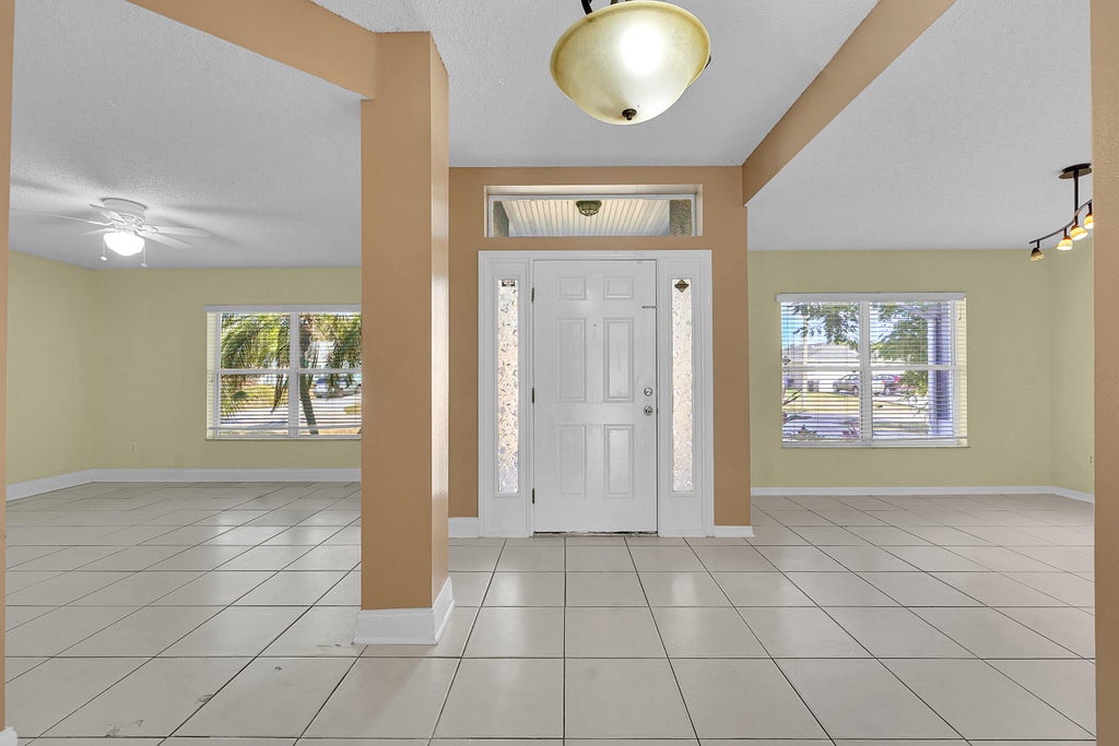 Photo of 2518 SE Cooper Lane, Port Saint Lucie, FL 34984 (MLS # R11149778)