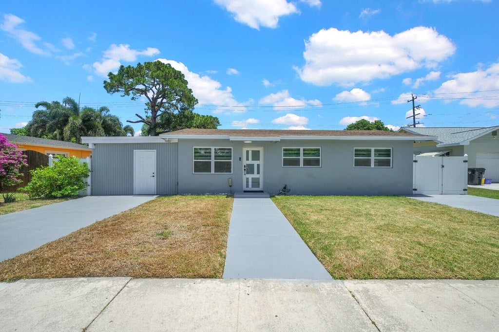 Photo of 1134 S Ridge Street, Lake Worth Beach, FL 33460 (MLS # B26049999)