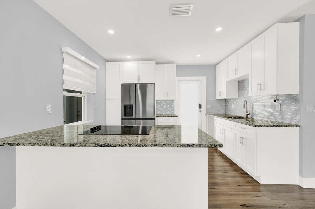 Photo of 1134 S Ridge Street, Lake Worth Beach, FL 33460 (MLS # B26049999)