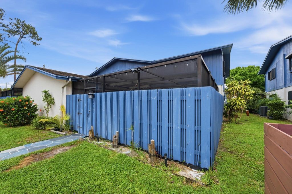 Photo of 4702 Holly Lake Drive, Greenacres, FL 33463 (MLS # B26003906)