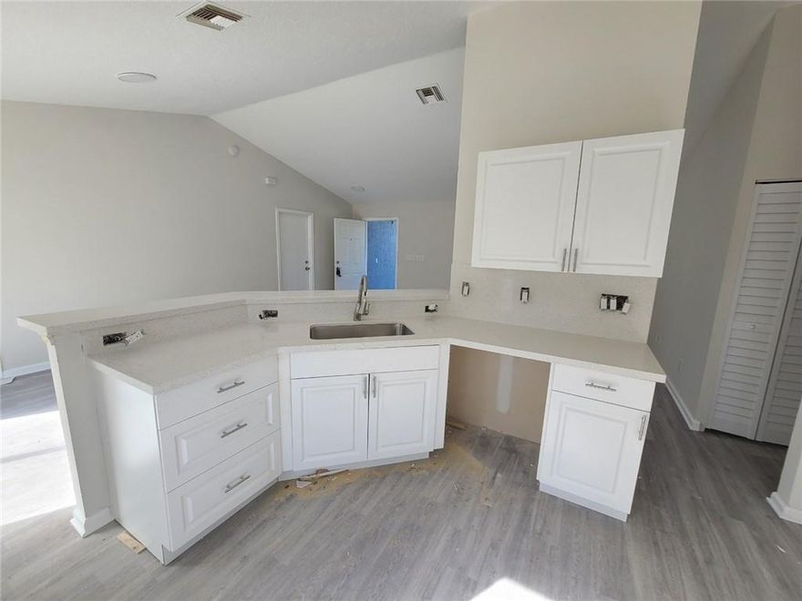 SPACIOUS 3/2 WITH 2 CAR GARAGE, RENOVATIONS ALMOST COMPLETE, RV & DUMPSTER WILL BE REMOVED SHORTLY, STAINLESS STEEL APPLIANCES WILL BE INSTALLED BEFORE CLOSING. NEW KITICHEN AND BATHROOM VANITY, FRESHLY PAINTED. AS IS, CORPORATION OWNED PROPERTY SEE SELLERS ADDENDUM, EASY TO SHOW.