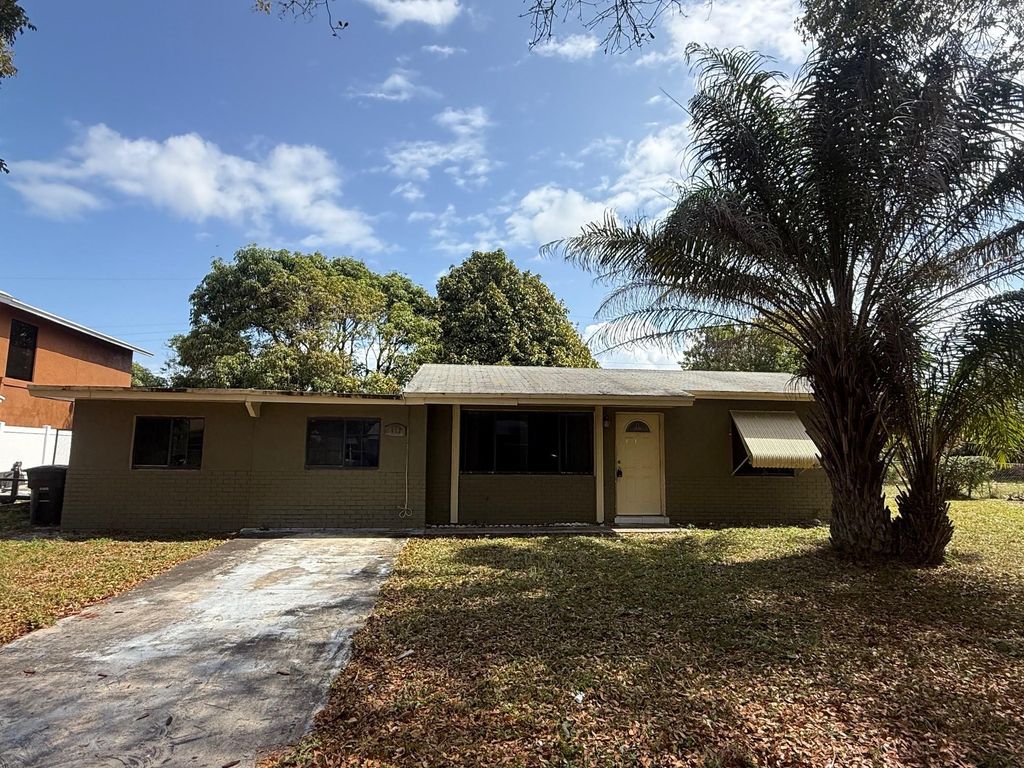 Photo of 412 S Chillingworth Drive, West Palm Beach, FL 33409 (MLS # F10499108)