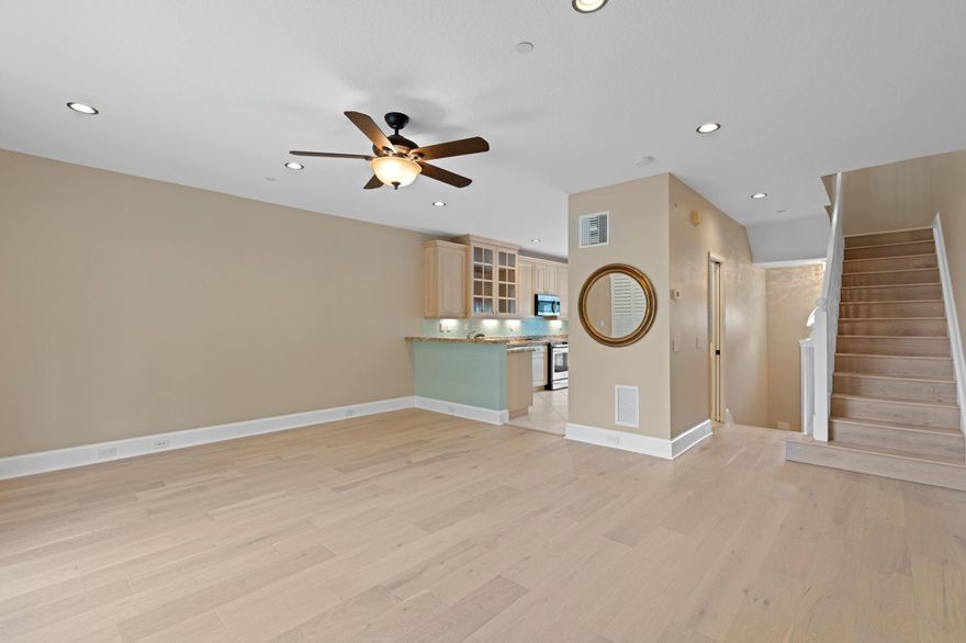 Townhouse Steps from the Beach!
 
This spectacular townhouse is located in the coveted community of Juno Dunes. The recently updated 2-bedroom, 2.5 bath townhouse sprawls three floors and boasts hardwood floors, plantation shutters, two balconies, an outdoor patio and a one-car tiled garage.
 
The large primary suite has vaulted ceilings, three custom built-out closets, and a bathroom with dual sinks, a soaking tub and a multi-head shower. The en-suite balcony showcases partial ocean views and coastal breezes. The second bedroom has two custom closets, and an en-suite bathroom with a spacious covered patio.
 
The living area and kitchen offer an open floor-plan flooded with light, allowing for the perfect space for entertaining. The kitchen features a windowed breakfast nook, granite countertops, custom backsplash, stainless steel appliances and ample storage/cabinetry throughout.
 
Additional features include impact windows and doors, washer/dryer, newly replaced hot water heater and updated lighting.
 
Juno Dunes is steps from the beach, Kagan Park, Pelican Lake and all that Juno Beach has to offer, making this one of the most desirable neighborhoods in South Florida.