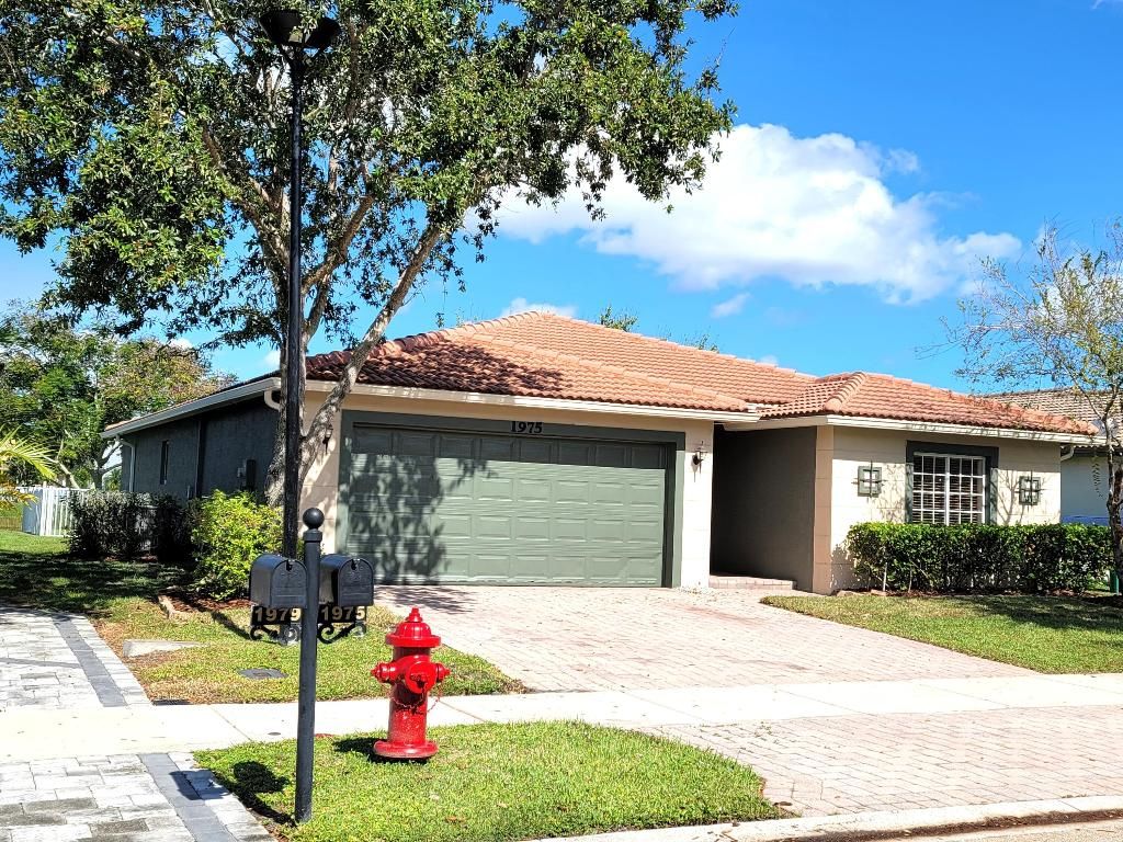 Photo of 1975 SW Jamesport Drive, Port Saint Lucie, FL 34953 (MLS # R10938088)