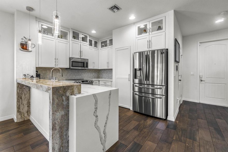 Discover this stylish 3BR/2.5BA townhome in East Lake Worth, just 5 mins from downtown and 10 mins from the beach. Renovated kitchen with double-stacked cabinets, custom quartz countertops, and a pantry. Luxurious vinyl floors upstairs. Master bathroom features a double sink with underlit quartzite countertop and a modern rainfall shower. Enjoy smart home features with voice-controlled lights and speakers. Easy access to I-95 and shops. Your modern, convenient, and stylish lifestyle awaits!