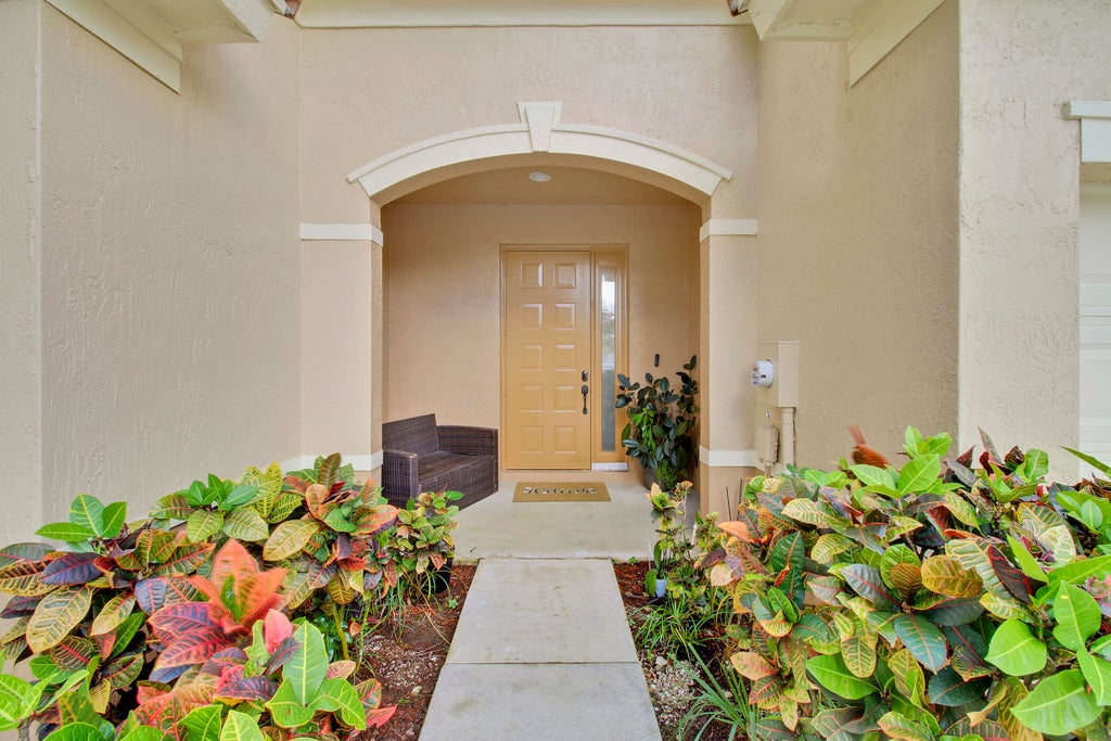 Photo of 431 Rainbow Springs Terrace, Royal Palm Beach, FL 33411 (MLS # B26094519)