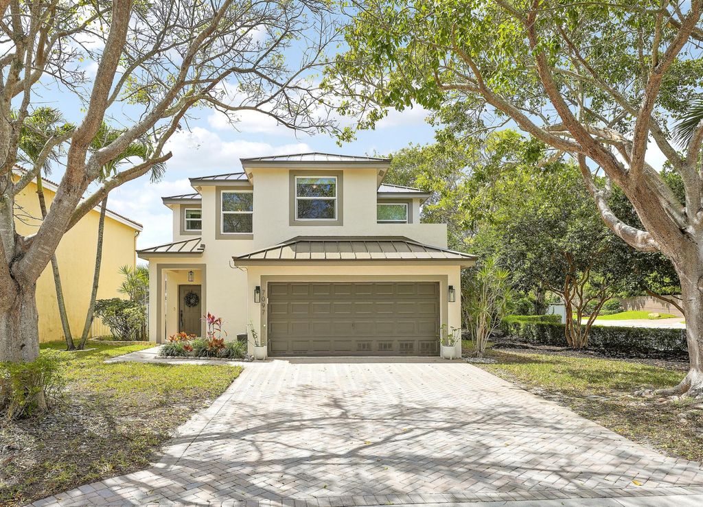 Photo of 7097 Crescent Creek Lane, Coconut Creek, FL 33073 (MLS # B26000460)