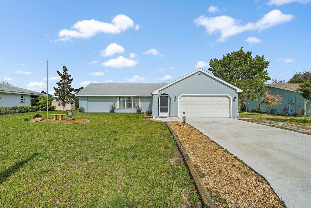 Photo of 1338 SE Buckingham Terrace Ter, Port St Lucie, FL 34952 (MLS # R10778448)