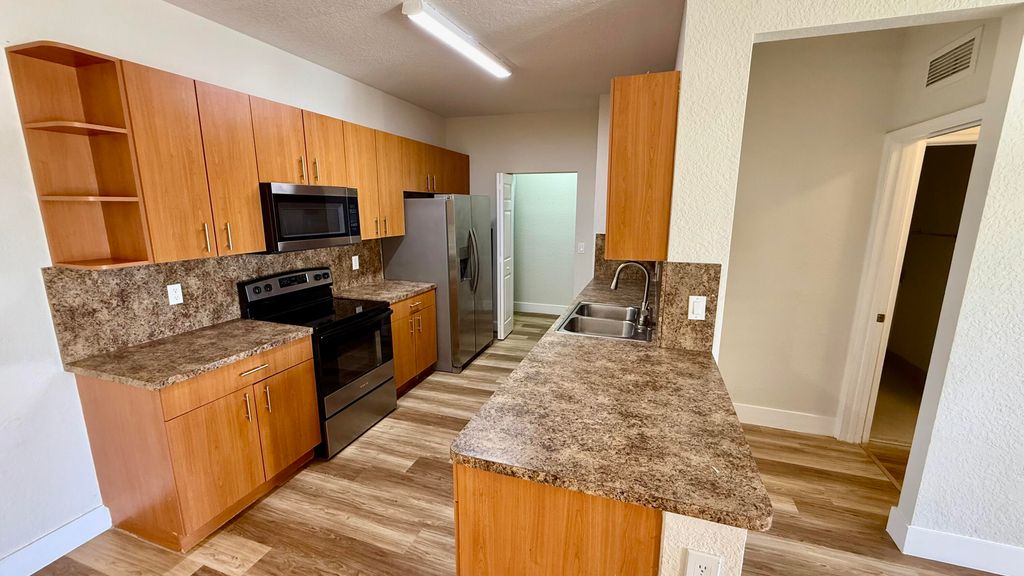 Photo of 3545 Forest Hill Boulevard #5, Palm Springs, FL 33406 (MLS # B26004483)