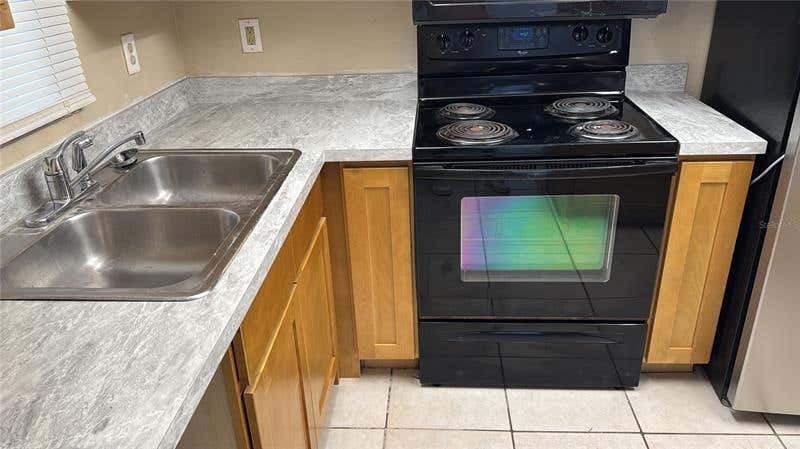 Photo of 2416 SE GARDEN Terrace #203, Port Saint Lucie, FL 34952 (MLS # B26057184)