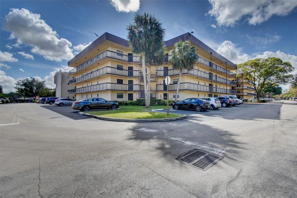 Photo of 6555 W Broward Blvd #303, Plantation, FL 33317 (MLS # F10529057)