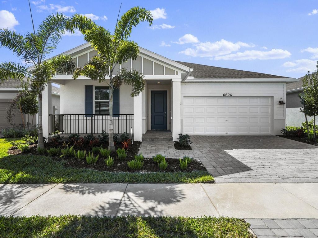 Photo of 6696 NW Cloverdale Avenue, Port Saint Lucie, FL 34987 (MLS # R10929401)