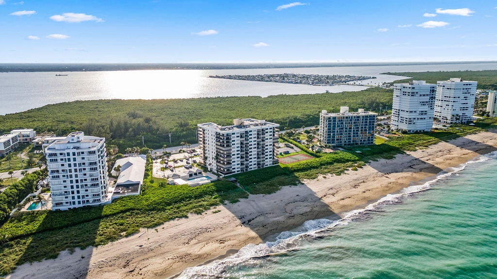 Photo of 10044 S OCEAN Drive #103, Jensen Beach, FL 34957 (MLS # B26074263)