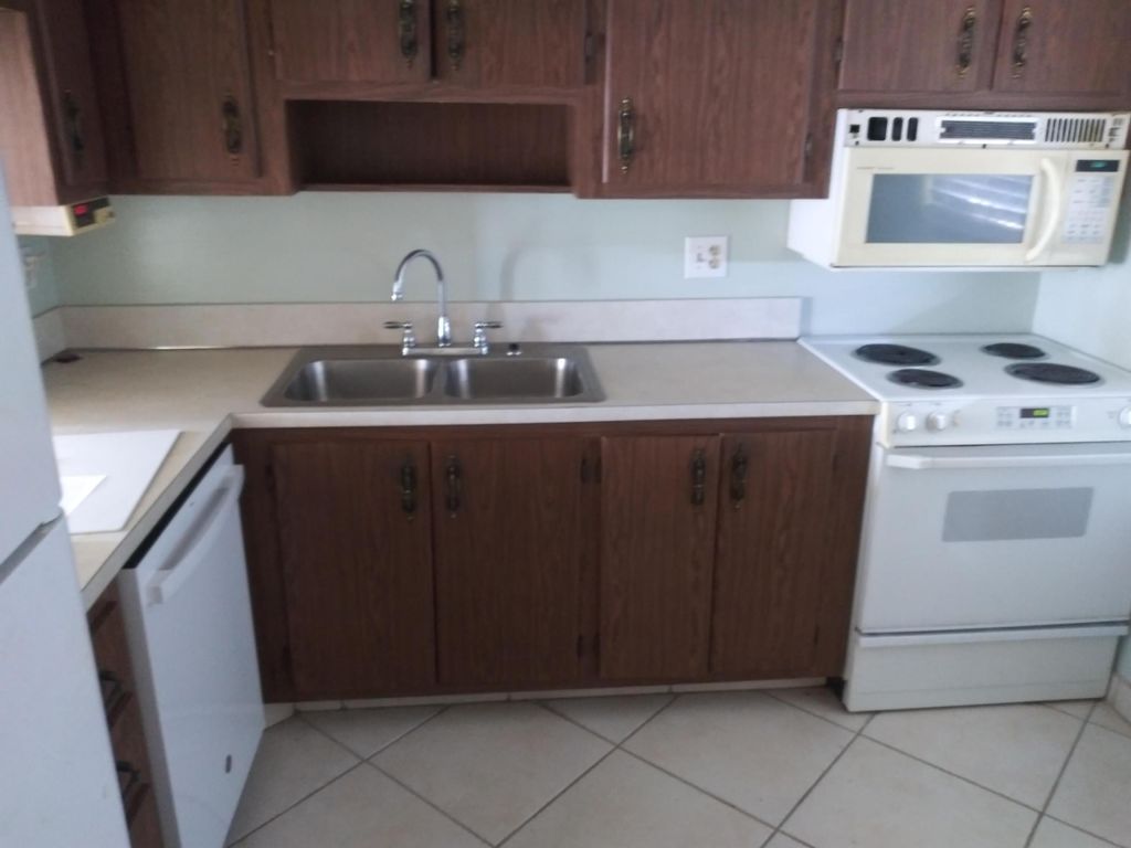 Photo of 2309 S Cypress Bend Drive #714c, Pompano Beach, FL 33069 (MLS # B26020159)