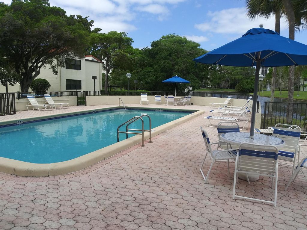 Photo of 2309 S Cypress Bend Drive #714c, Pompano Beach, FL 33069 (MLS # B26020159)