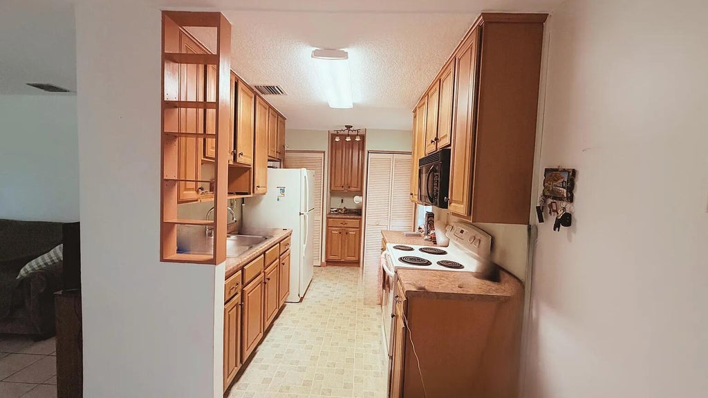 Photo of 2573 NW 58th Avenue, Margate, FL 33063 (MLS # B26073793)