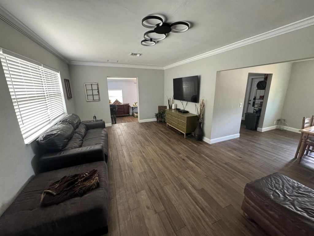 Photo of 459 Silver Beach Road, Lake Park, FL 33403 (MLS # R11000978)