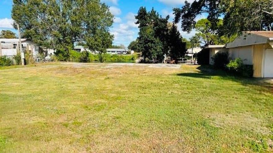 Discover the perfect setting for your future home on this stunning canal front lot, ideally located on a quiet, paved dead-end cul-de-sac on SE 21st Ct. Offering approximately 76 ft of seawall and 111 ft of depth, this property provides direct water access with a canal depth of about 5 ft. Just minutes from Taylor Creek and the Lake Okeechobee lock, you’ll enjoy quick and easy access to some of the best fishing in Florida. The lot is cleared and build-ready, with city water and electric available at the street—making your building process seamless. Boating enthusiasts will appreciate the convenience of reaching both coasts by water, adding to the exceptional versatility of this location. Don’t miss the opportunity to secure this prime piece of waterfront property—this one won’t last long!