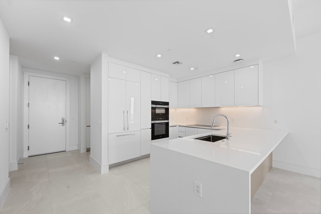 Photo of 220 Lake Shore Drive #811, Lake Park, FL 33403 (MLS # B26014051)