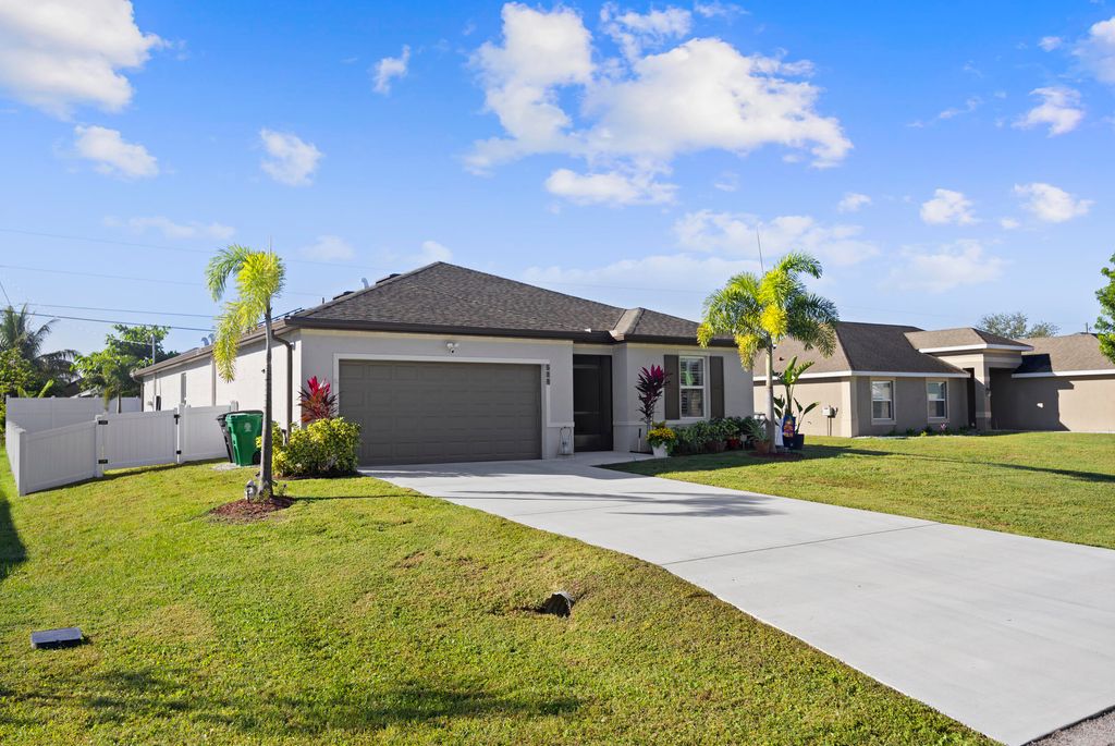 Photo of 514 SW Kabot Avenue, Port Saint Lucie, FL 34953 (MLS # R11138699)