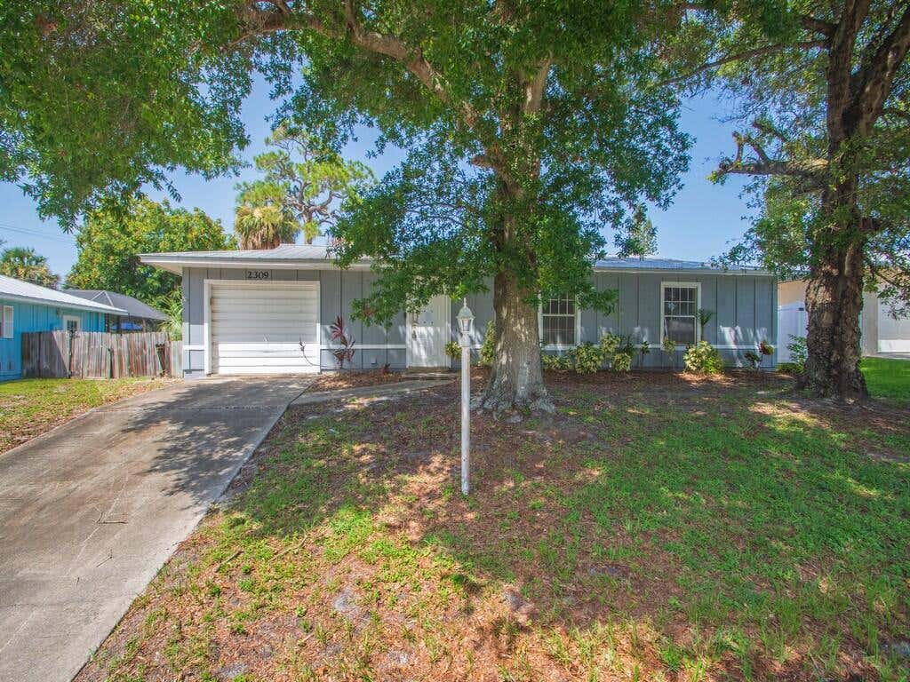 Photo of 2309 NE 13th Court, Jensen Beach, FL 34957 (MLS # B26052201)