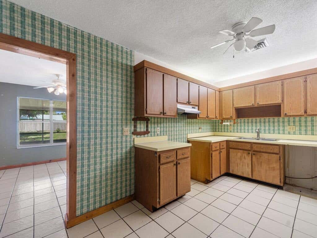 Photo of 2309 NE 13th Court, Jensen Beach, FL 34957 (MLS # B26052201)