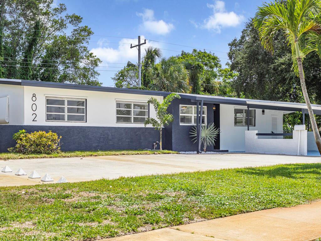 Stunningly Redesigned Home in the Heart of North Palm Beach Village. This beautifully reimagined and very rare 4-bedroom, 3 full bath residence blends high-end designer finishes with everyday functionality. Nearly everything is brand new--NEW AC, cabinetry, appliances, flooring, bathrooms, countertops, LED lighting, and more. The thoughtfully designed layout includes a second bedroom with an ensuite bath, ideal for guests or multigenerational living. The spacious primary suite features agenerous walk-in closet and a luxurious, spa-like bathroom retreat. Located in the sought-after North Palm Beach Village, only a few hundred yards from the water, with no HOA, this home offers unmatched convenience. Just a short stroll to the Conservatory School and Anchorage Park with its playground