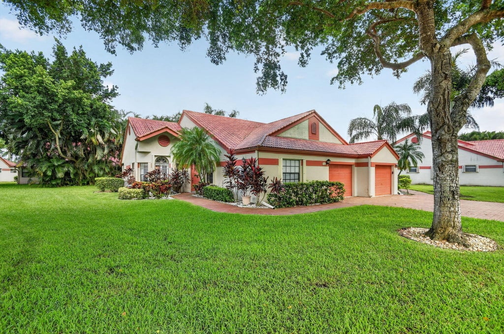 Photo of 7573 Lexington Club Boulevard #A, Delray Beach, FL 33446 (MLS # B26078438)
