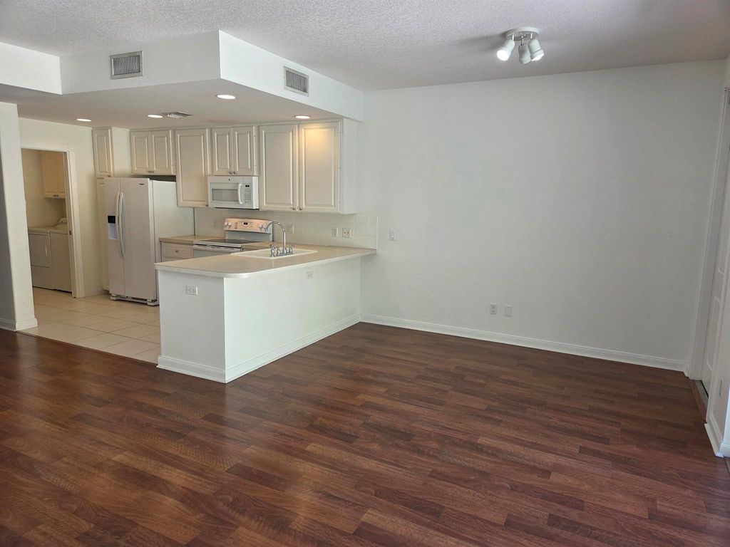 Photo of 155 Andover Drive, Jupiter, FL 33458 (MLS # R11115332)