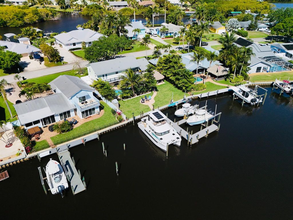 Photo of 691 SW Pine Tree Lane, Palm City, FL 34990 (MLS # R11090541)