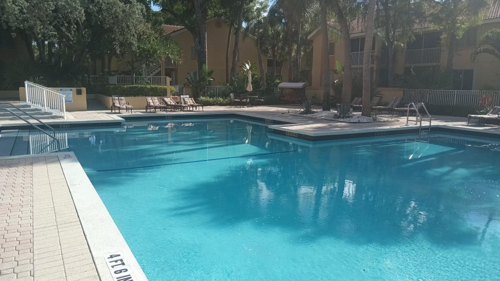 Photo of 1055 Coral Club Drive #1055, Coral Springs, FL 33071 (MLS # F10526485)