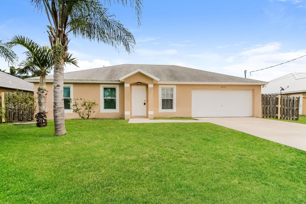 Photo of 2025 SE Mantua Street, Port Saint Lucie, FL 34952 (MLS # R11029714)