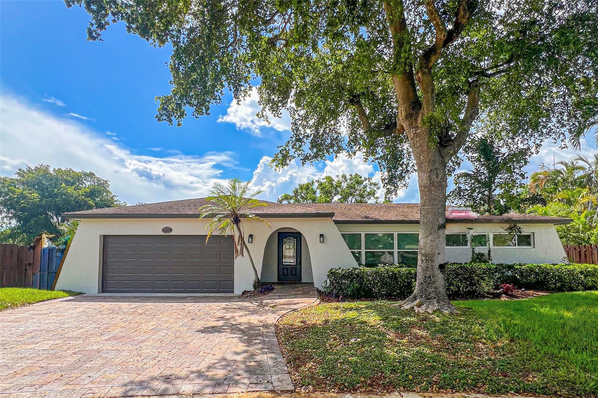 Reintroducing this beautifully updated 4-bedroom, 2-bath single-family home located on a quiet cul-de-sac in highly sought-after Cooper City, known for its small-town feel and top-rated schools like Cooper City Elementary, Pioneer Middle, and Cooper City High, all within walking distance. This home features impact windows, stainless steel appliances, new laminate flooring, security alarm, fresh interior and exterior paint, and a renovated master bathroom. Enjoy the large heated, screened-in pool and a covered patio perfect for year-round outdoor living. The spacious backyard offers peaceful canal views and plenty of room to entertain. Don’t miss this incredible opportunity to live in one of Broward County’s most desirable and community-driven neighborhoods.