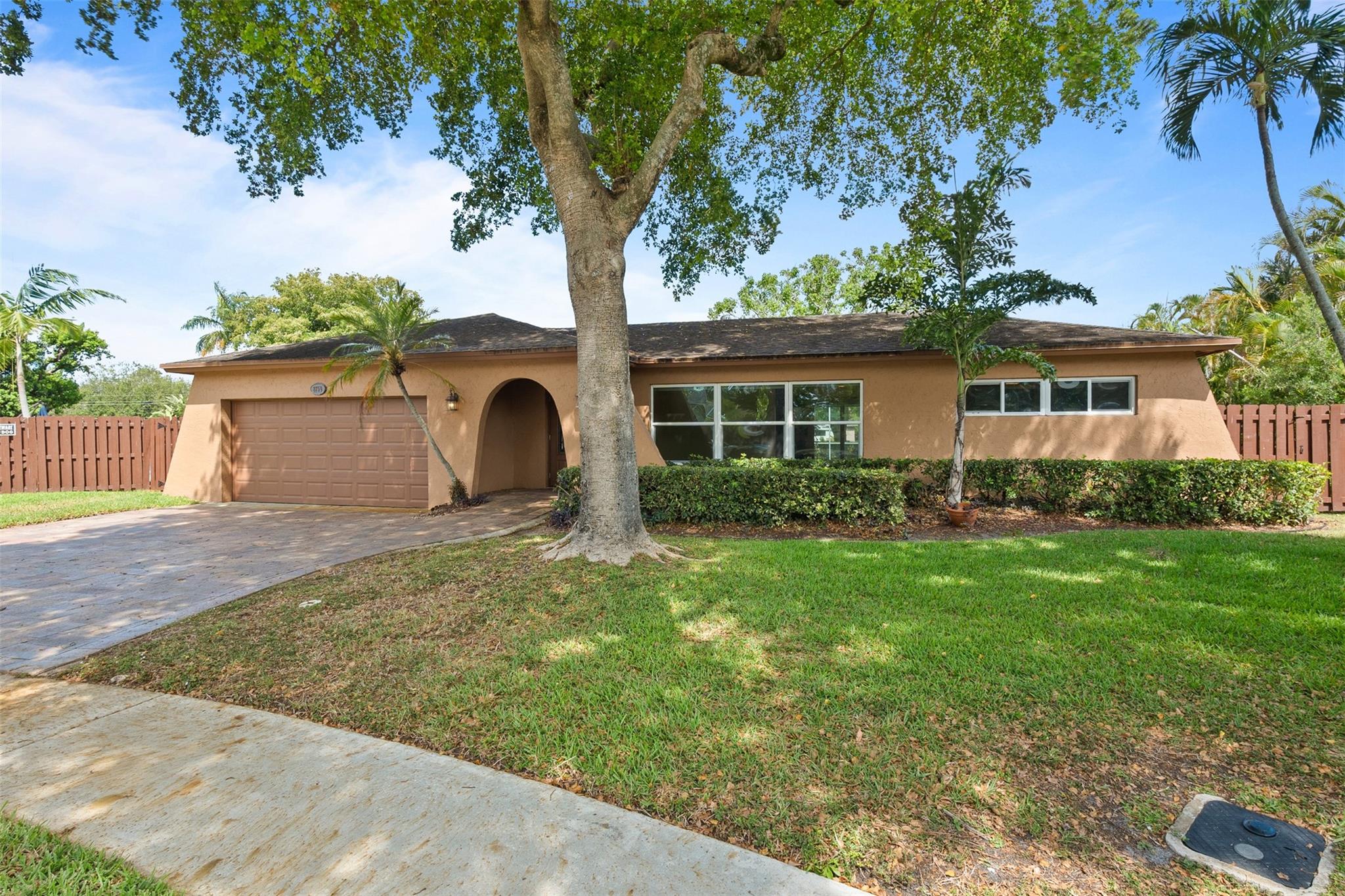 HUGE PRICE IMPROVEMENT! 4/2 single-family home located on a quiet cul-de-sac in highly desirable Cooper City, a community known for its small-town feel and A-rated schools such as Cooper City Elementary, Pioneer Middle, and Cooper City High School, all within walking distance from this amazing property. This home features impact windows, stainless steel appliances, a heated screened-in pool, and a covered patio, perfect for year-round outdoor living. Inside, you'll find a practical layout, an upgraded master bathroom, and plenty of space for comfortable living. Enjoy a huge backyard with canal views, offering both privacy and room to entertain. Don’t miss this opportunity to live in one of Broward County’s most sought-after neighborhoods, where pride of ownership and community truly shine.
