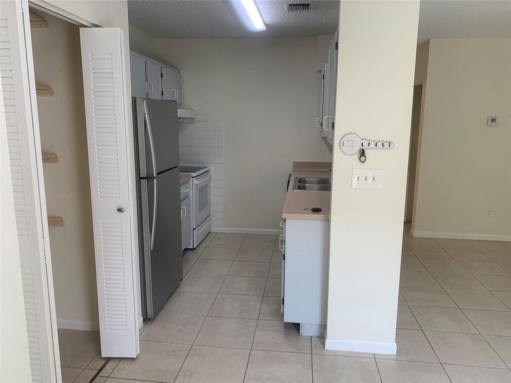 Photo of 10641 NW 45th St #10643, Coral Springs, FL 33065 (MLS # F10520001)